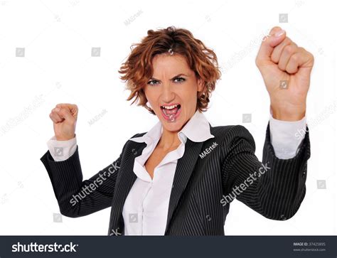 Successful Business Woman In Charge And Excited With Her Arms Up In