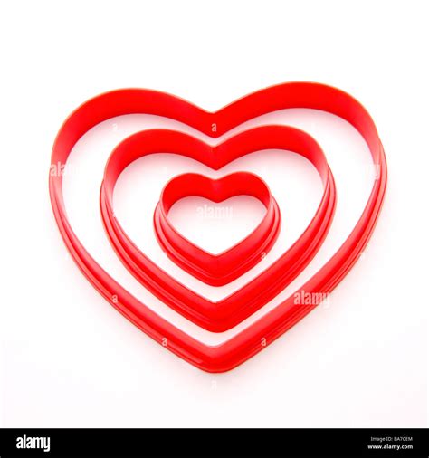 Three Different Sized Heart Shaped Objects Stock Photo Alamy