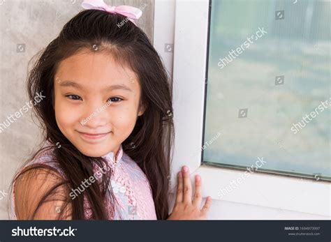 Happy Portrait Cute Asian Girl Smile Stock Photo 1694973997 Shutterstock