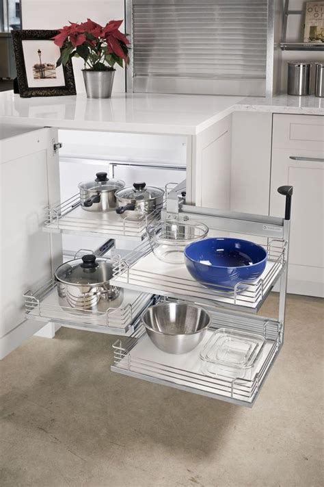 Swing out corner cabinets are a good way to maximize the storage capabilities of a kitchen. Magic Corner II: Turn awkward corner storage into easily ...