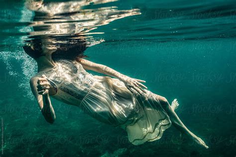 Underwater Photo Of Beautiful Woman Swimming In Boho Dress By Jenny