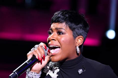 Fantasia Shows Off Her Curves In Leather Outfit Thigh High Boots