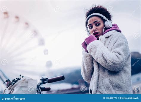 Charming Brunette Female Trying To Warm Her Up Stock Image Image Of Interaction Music 136466773
