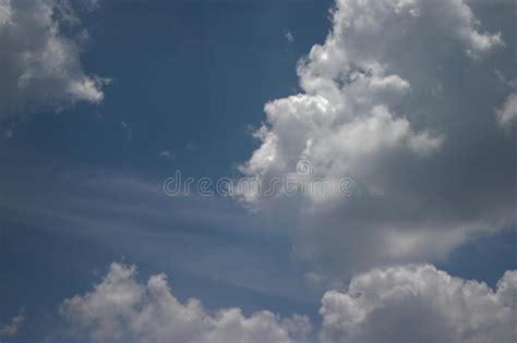 Cumulus Clouds With A Clear Blue Sky Background In The Midday Types Of