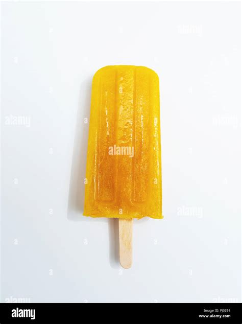 Ice Lollies Orange Fruit Ice Cream Presented On A White Background