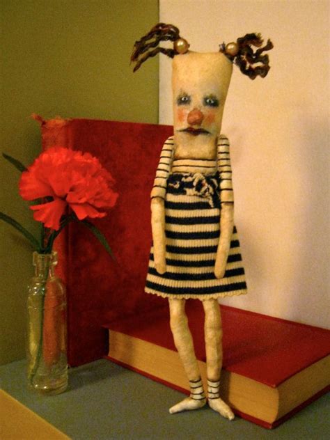 a weird art doll in stripe dress sandy mastroni weird doll bizarre spooky odd doll weird