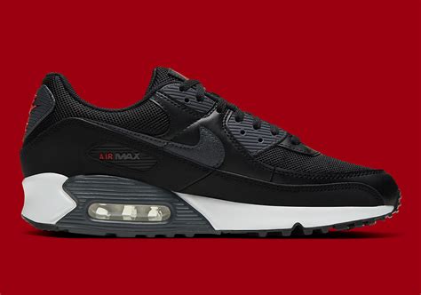 The Nike Air Max 90 Surfaces In The New Year In Simple Black Red And