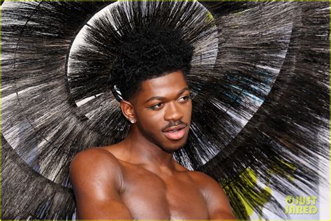 Lil Nas X Goes Shirtless While Wearing Over The Top Headpiece