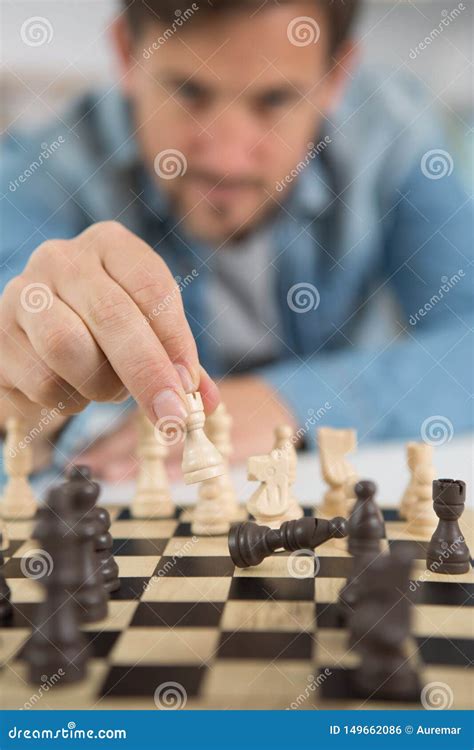 Young Man Playing Chess Stock Photo Image Of Chessboard 149662086