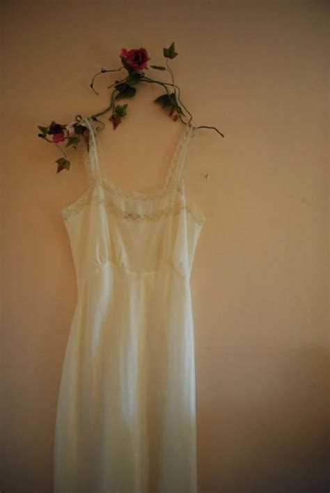 classy vintage 50s white nylon full slip dress with lace and pleats made by barbizon size 6 8