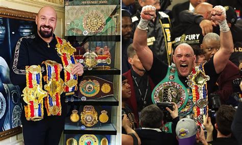 Tyson Fury Shows Off His Amazing Four Ring Magazine Belts And