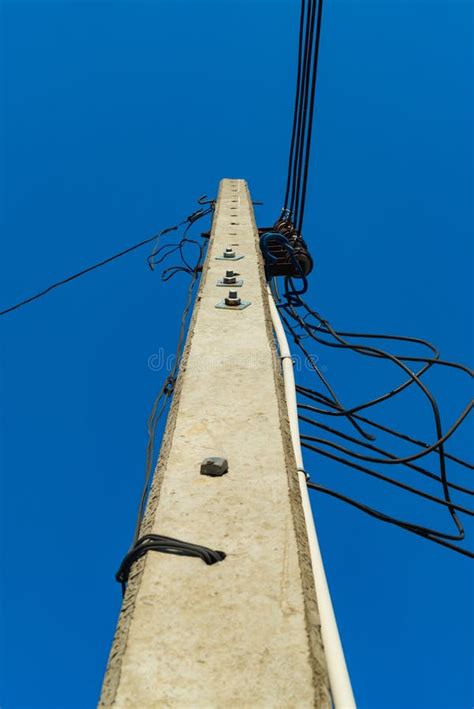 High Voltage Power Pole With Wires Tangled Stock Image Image Of
