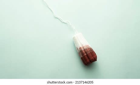 Bloody Tampon On Studio Background Red Stock Photo