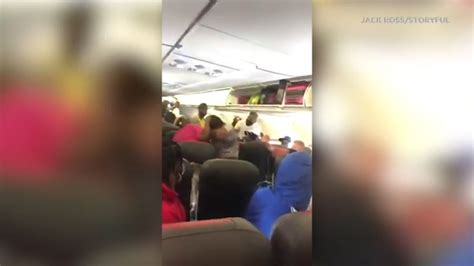 delta air lines passenger slaps flight attendant on plane in miami incident caught on viral