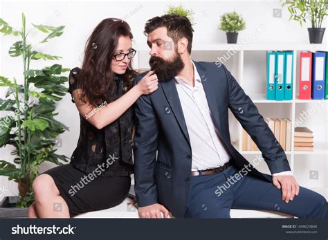 Seductive Colleague Flirting Boss Man Woman Stock Photo 1698023848