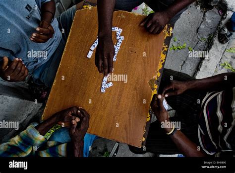 Haitian Men Play Dominoes On The Street Of Port Au Prince Haiti Stock