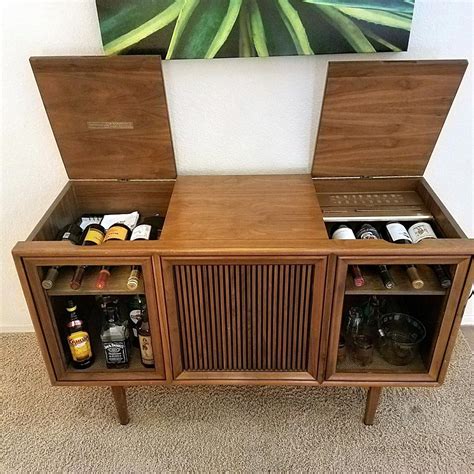 And check out the lighting inside the bar cabinet too!! Amazing DIY Home Bar | Vintage stereo cabinet, Diy home bar, Mid century bar cabinet