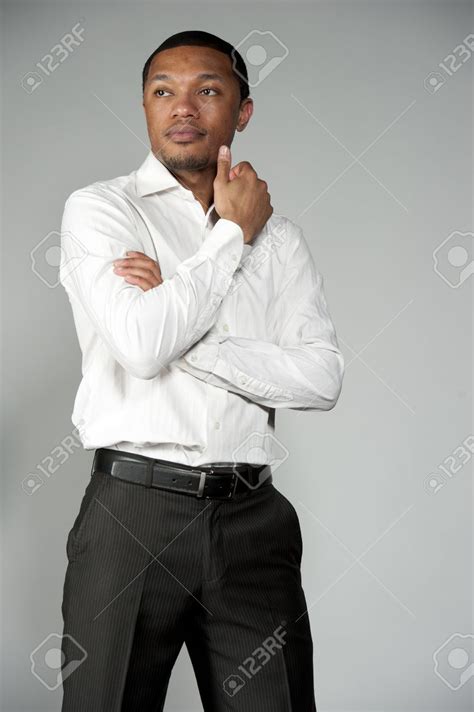 Zambian Men Are Typically Seen Wearing Nice Slacks And Button Down