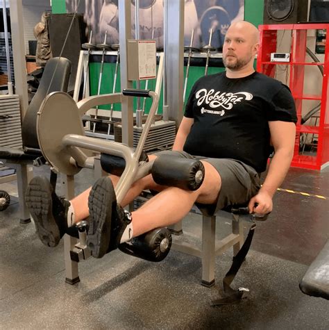 How To Do Seated Leg Curl Muscles Worked And Proper Form Strengthlog