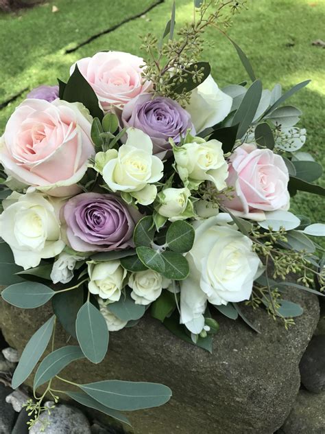 bouquet of roses lavender soft pink and whites corporate flowers wedding flowers bridal