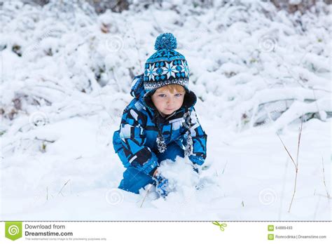 Happy Child Having Fun With Snow In Winter Stock Image Image Of Cute