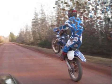Getting over logs or large gaps and streams or other obstacles. 2 stroke dirt bike wheelies - YouTube