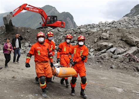 Rescue Workers In China Search For Landslide Victims