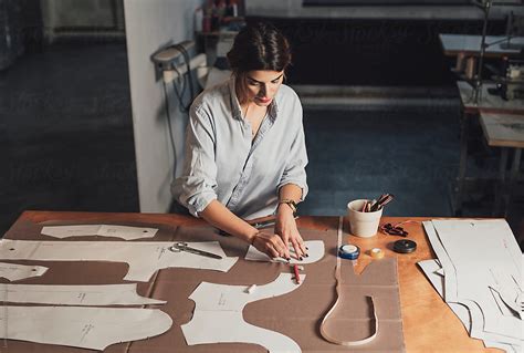 Woman Tailor Working With Patterns Del Colaborador De Stocksy Lumina Stocksy