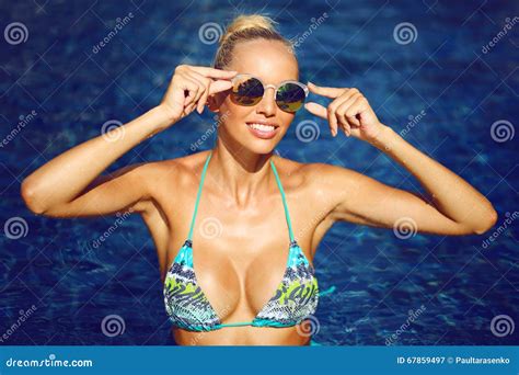 Beautiful Girl Posing By The Pool In Sunglasses Outdoor Fashion Stock