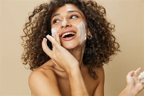 Woman Beauty Face Close Up Applying Foam To Wash And Cleanse Skin With Fingers Of Her Hand Nail