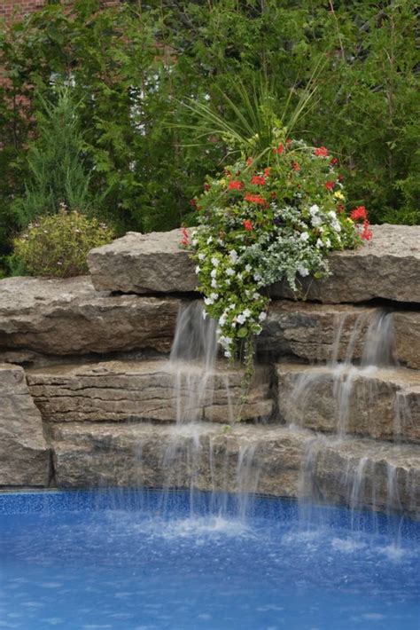 Turn the pool pump off first. 80 Fabulous Swimming Pools with Waterfalls (Pictures)