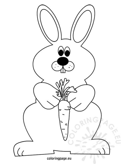 Easter Rabbit With A Carrot Coloring Page