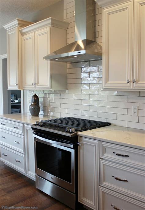 White Kitchen With Long Subway Tile Design And Materials By Village Ho