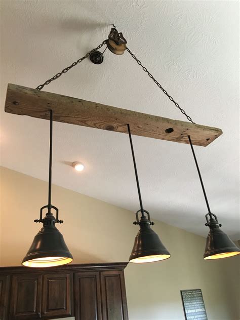 Hanging light fixtures are more adapted for task and ambient lighting. Barn wood pulley vaulted ceiling light fixture Pendants ...
