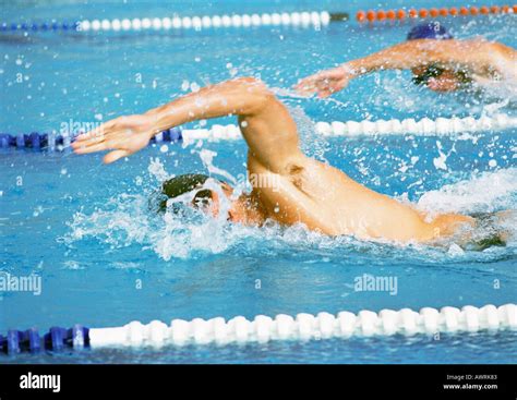 Male Swimmers Doing Freestyle In Pool Close Up Stock Photo Alamy