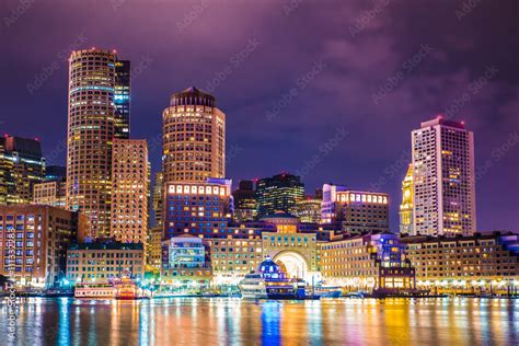 Beautiful Night View Of Boston Massachusetts Skyline And Boston Harbor