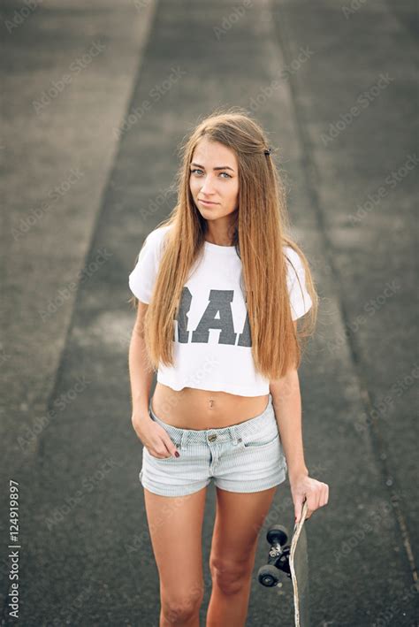 Cute Beautiful Teen Girl With Perfect Body In A White T Shirt And Short