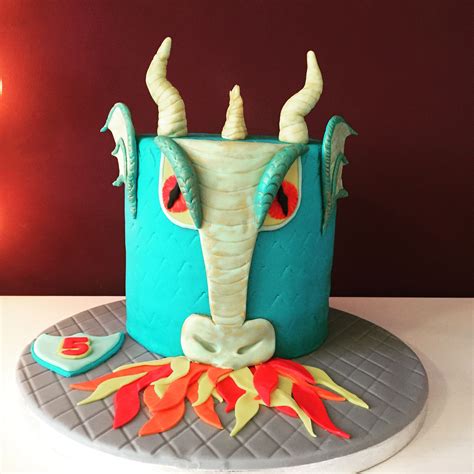 A Birthday Cake Decorated With An Elephants Head