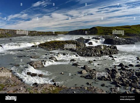 The River Thjorsa Flows Over Urriðafoss Waterfall In South West Iceland