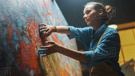Talented Innovative Female Artist Draws With Her Hands On The Large