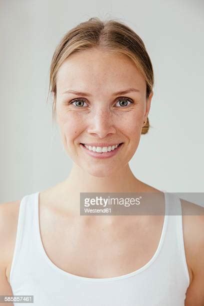 Woman In White Tank Top Photos And Premium High Res Pictures Getty Images