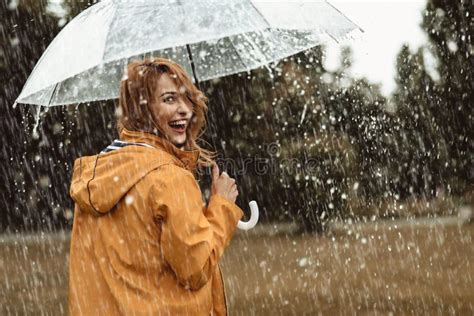 Joyful Woman Walking In Rainy Weather Stock Photo Image Of Delight