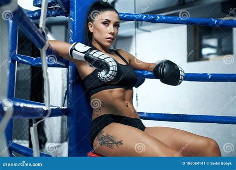 Female Kickboxer Having Rest On Ring Corner Stock Image Image Of Boxer Ring