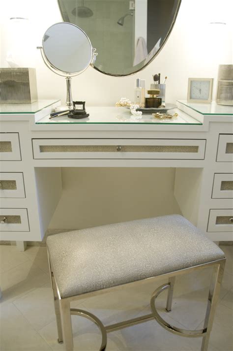 Whatever the design of your makeup area, be sure the countertop can be comfortably reached from a sitting position. Sumptuous makeup vanities in Bathroom Transitional with Vanity Table next to Master Bath Vanity ...