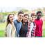 Multiethnic Group Of Teenagers Smiling Outdoors Together Stock Photo 