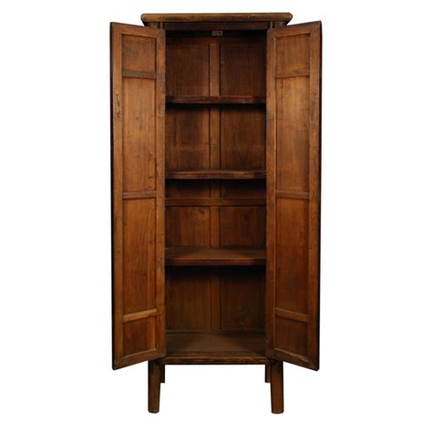This sleek, narrow cabinet from bloomingdale's looks updated and modern, but also has wheels for easy access and refills. 19th Century Chinese Tall and Narrow Cabinet at 1stdibs
