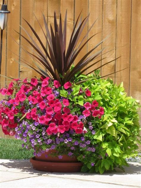 Because artificial flowers don't require any water, you can put them in anything! 75 Beautiful Summer Container Garden Flowers Ideas ...