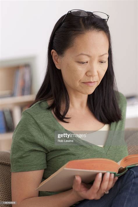 Usa California Los Angeles Portrait Of Woman Reading Book High Res