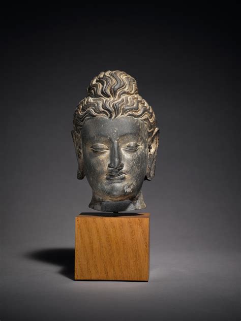 a gray schist head of buddha ancient region of gandhara 2nd 3rd century indian himalayan