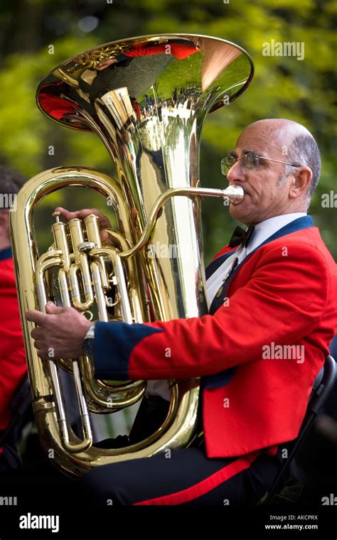 A Tuba Player In The Band At The Rhs Chelsea Flower Show London